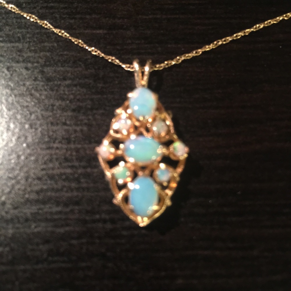 14 k Gold chain and Opal pendant.